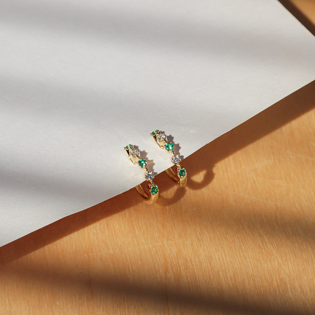 Stardust emerald diamond huggies